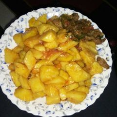 Yams and beef stew A picture of Yams and beef stew.