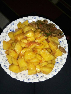 A picture of Yams and beef stew.
