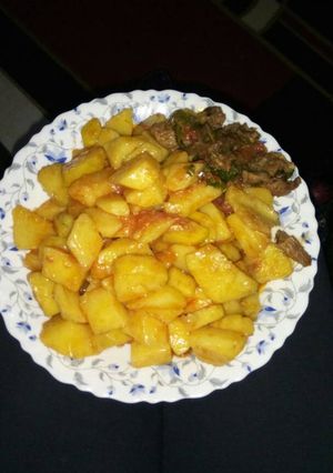 A picture of Yams and beef stew.