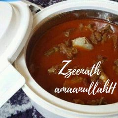 A picture of Spicy Red Mutton Gravy.