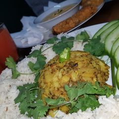 Jhatpata allu with zeera rice A picture of Jhatpata allu with zeera rice.