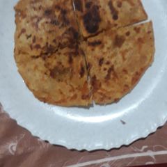 A picture of Aloo stuffed paratha.