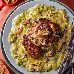 A picture of Sticky Honey & Mustard Chicken With Creamy Leeks & Crispy Onions.