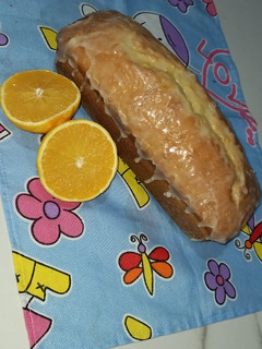 Una foto de Budín de naranja sin manteca 🍊 ♡