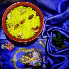 A picture of Meetha Kanika (Sweet rice in pressure cooker).