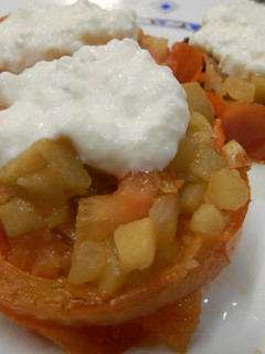 Una foto de Tomates asados con berenjenas