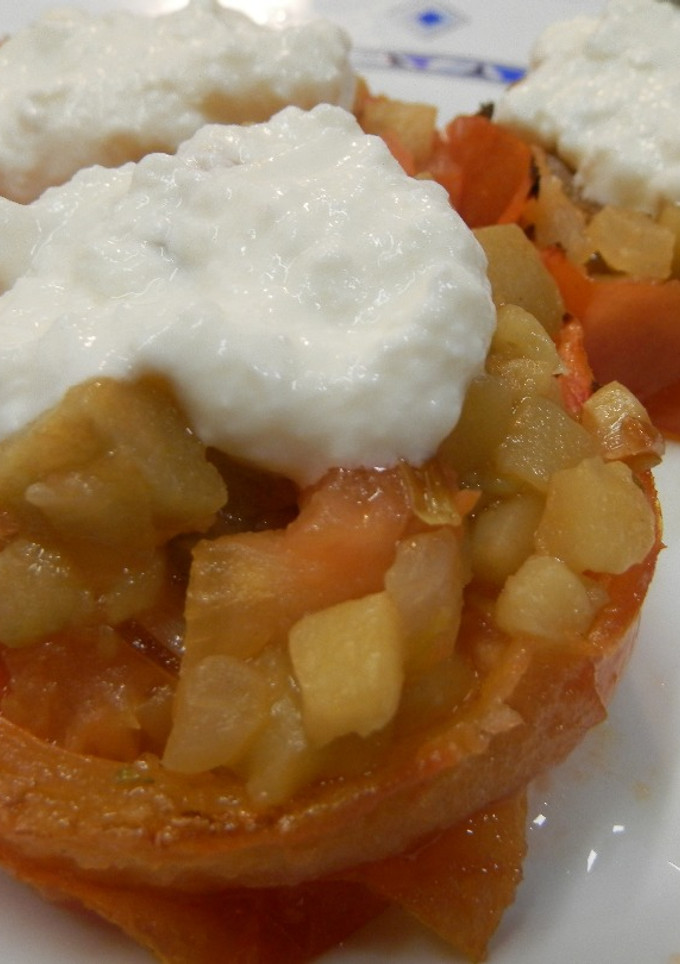 Una foto de Tomates asados con berenjenas