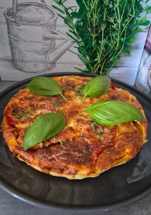 Une photo de Quiche rustique au poulet et tomates 🍅 du jardin 😃