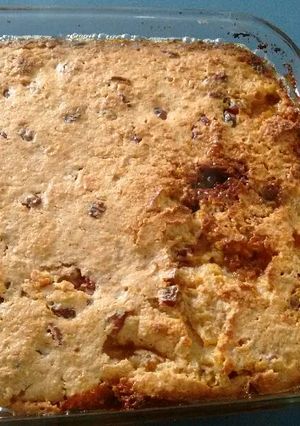 Una foto de Budín de pan con arándanos y almendras. ॐ