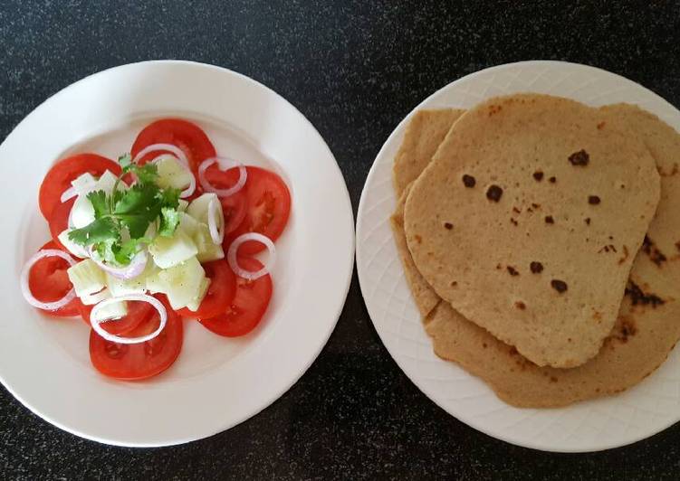 Simple salad with flat bread roti