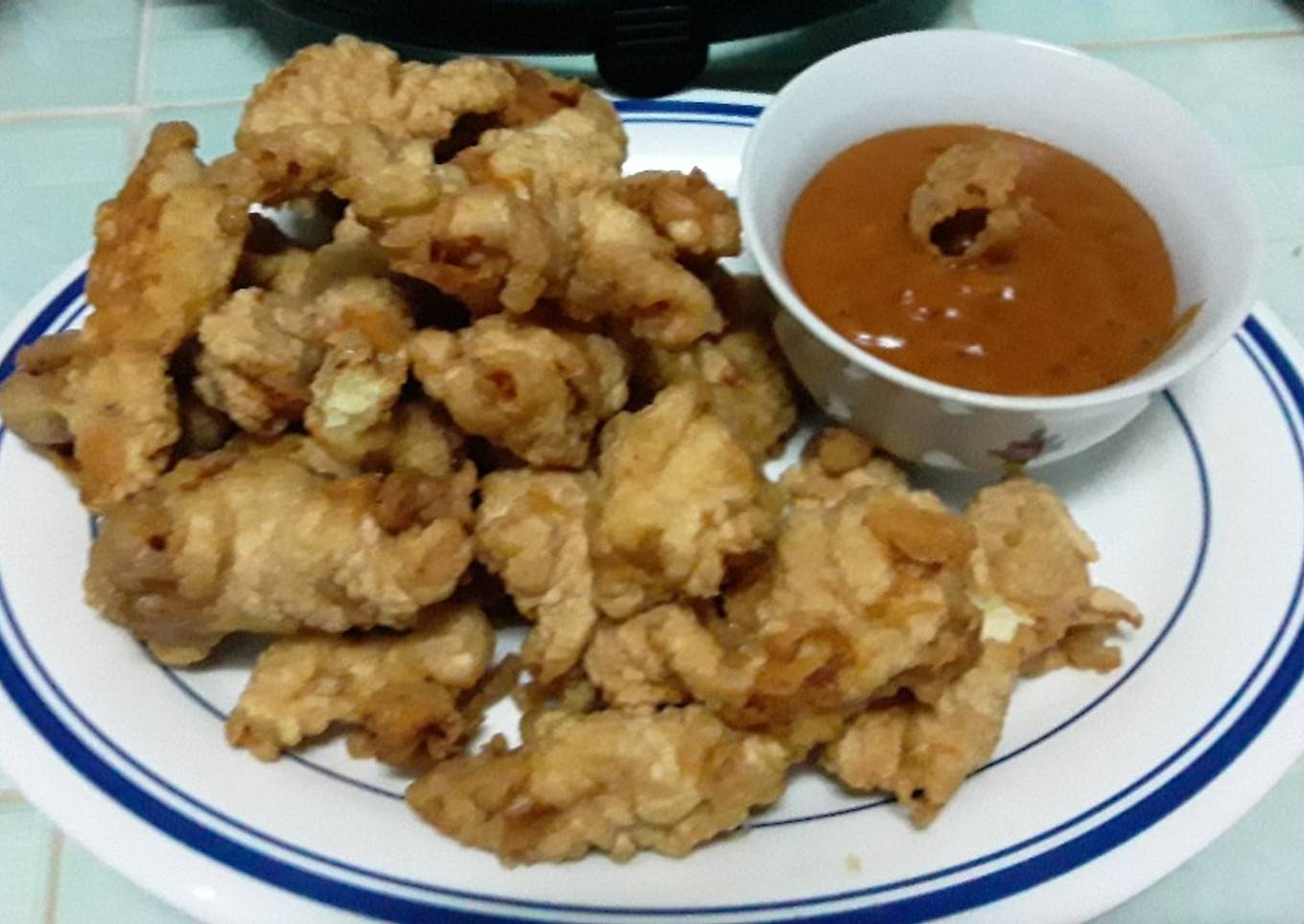 Fajitas de pollo rebozadas con salsa rosa