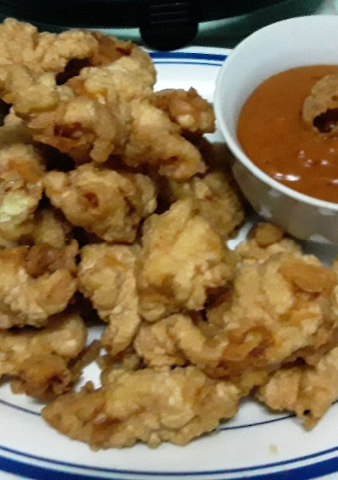 Una foto de Fajitas de pollo rebozadas con salsa rosa