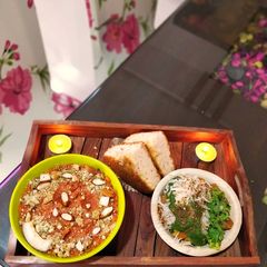 A picture of Gajar ka halwa and moong dal pakora (Ram ladoo).