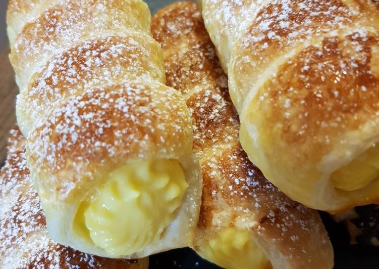 Cannoli farciti con crema all'arancia