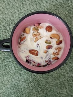 صورة لوصفة رمان بالقشطه والمكسرات