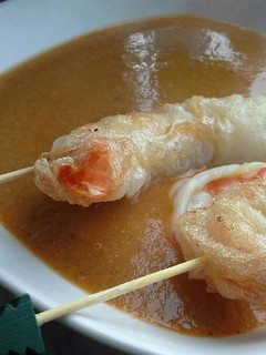 Una foto de Bisque y crujiente de langostinos