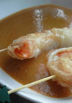 Una foto de Bisque y crujiente de langostinos