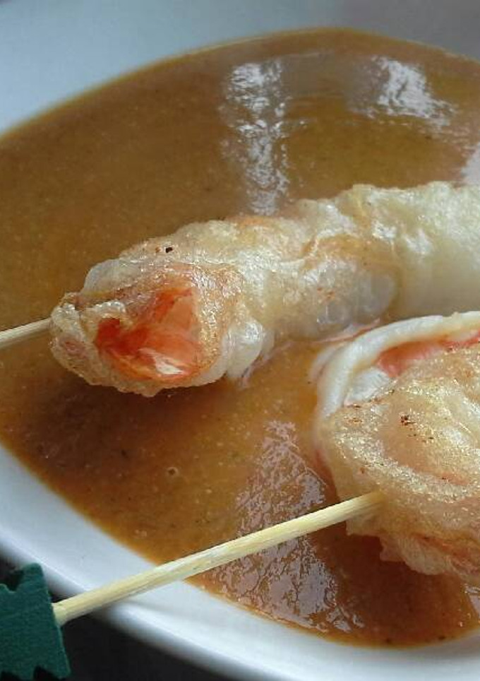 Una foto de Bisque y crujiente de langostinos