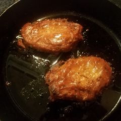 A picture of Seared Pork Chops with Apple Butter BBQ Sauce.