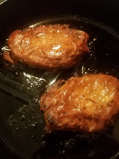 A picture of Seared Pork Chops with Apple Butter BBQ Sauce.