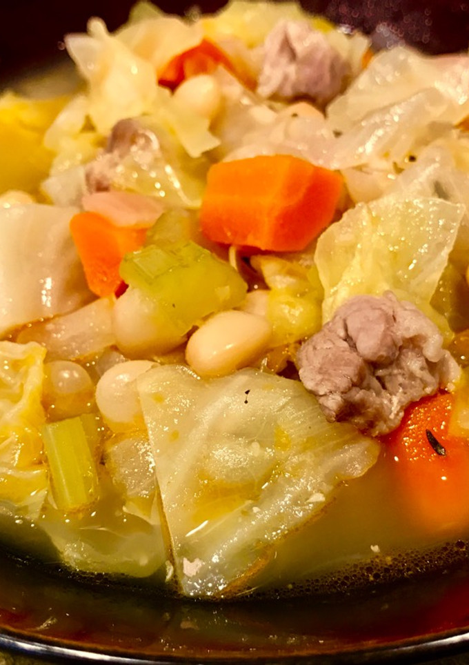 A picture of Simple Cabbage & Bean Soup with Pork.