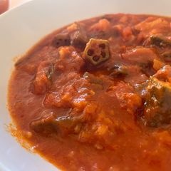 A picture of Lebanese style okra with tomato sauce.