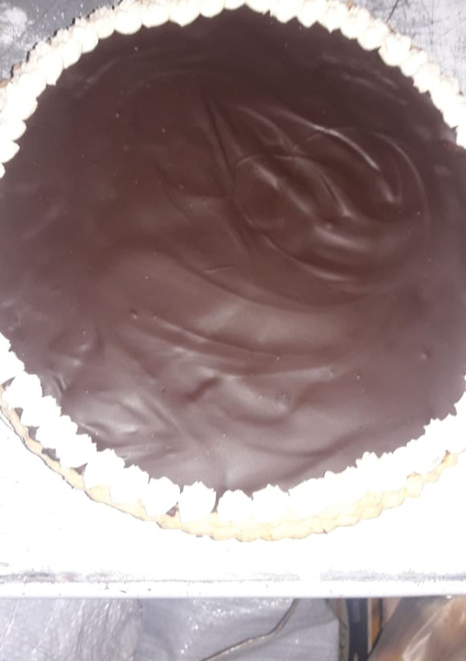 Una foto de Tarta de dulce de leche y chocolate