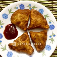 A picture of Wheat Onion Samosas.