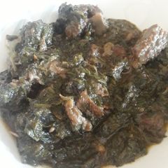A picture of Spinach with meat.