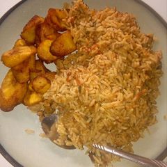 A picture of Jollof rice and fried plantain.