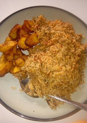 A picture of Jollof rice and fried plantain.
