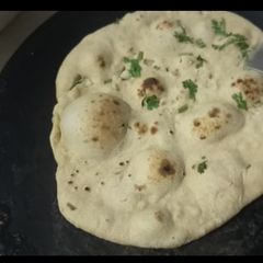A picture of Whole wheat Naan on tawa.