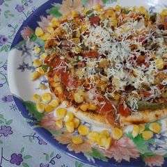 A picture of Mozerella cheese grilled pizza.