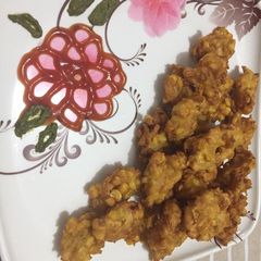 A picture of Crispy sweet corn fritters.