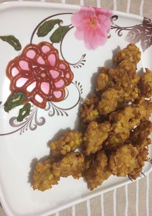 A picture of Crispy sweet corn fritters.