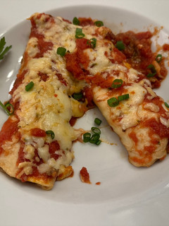 A picture of Beef Enchiladas (no beans).