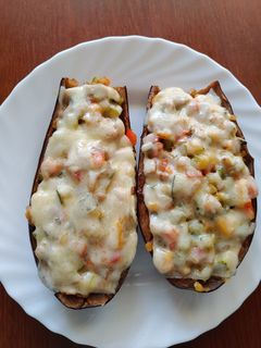 Una foto de Berenjenas rellenas de verdura