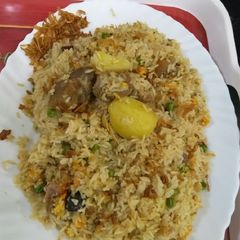 A picture of Mutton yakhni polaw potato green piece.