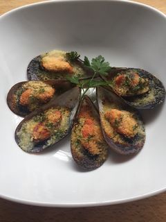 Una foto de Mejillones gratinados al estilo de Puglia