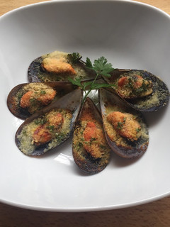 Una foto de Mejillones gratinados al estilo de Puglia