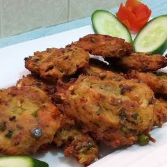 A picture of Kache Aloo ke Kebab.