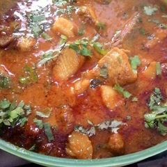 A picture of Fish gravy with Aloo.