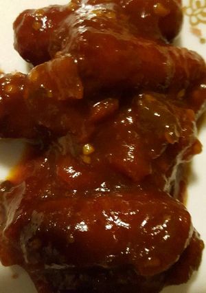 A picture of Tangy sweet little smokies .