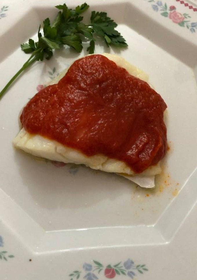 Una foto de Bacalao con tomate
