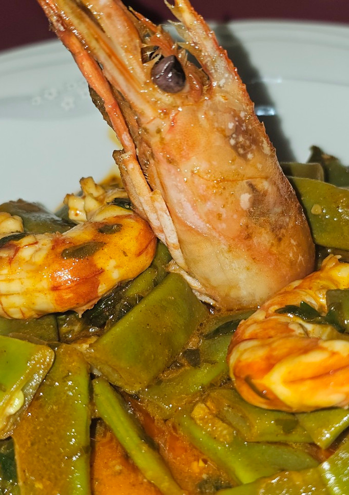 Una foto de Judías verdes y gambas langostineras