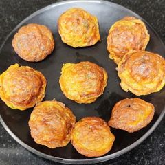 Egg vegetable paniyaram A picture of Egg vegetable paniyaram.