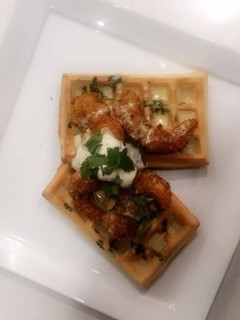 A picture of Savoury Waffle with Coconut crumbed prawns.