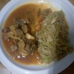 A picture of Stewed Beef with steamed Cabbage.