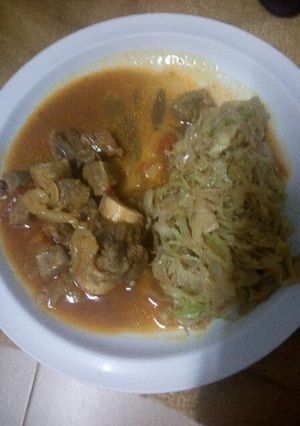 A picture of Stewed Beef with steamed Cabbage.