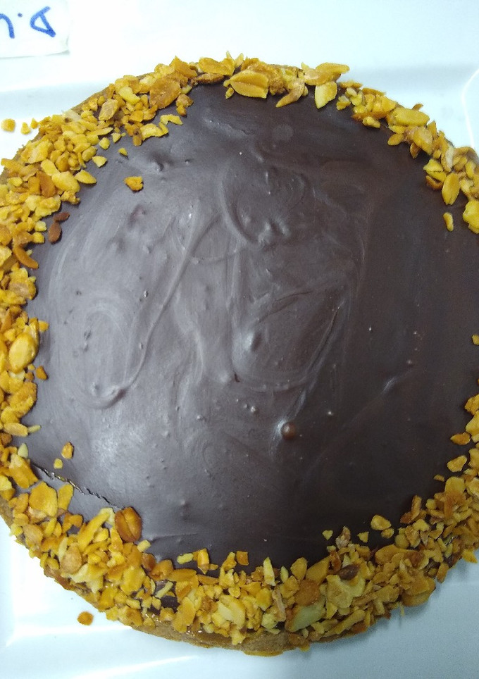 Una foto de Tarta toffee con ganache de chocolate y maní
